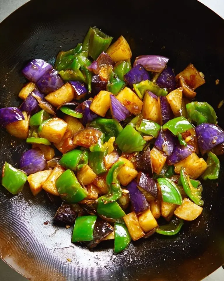 Plate of Dongbei stir-fried eggplant, potato, and bell pepper
