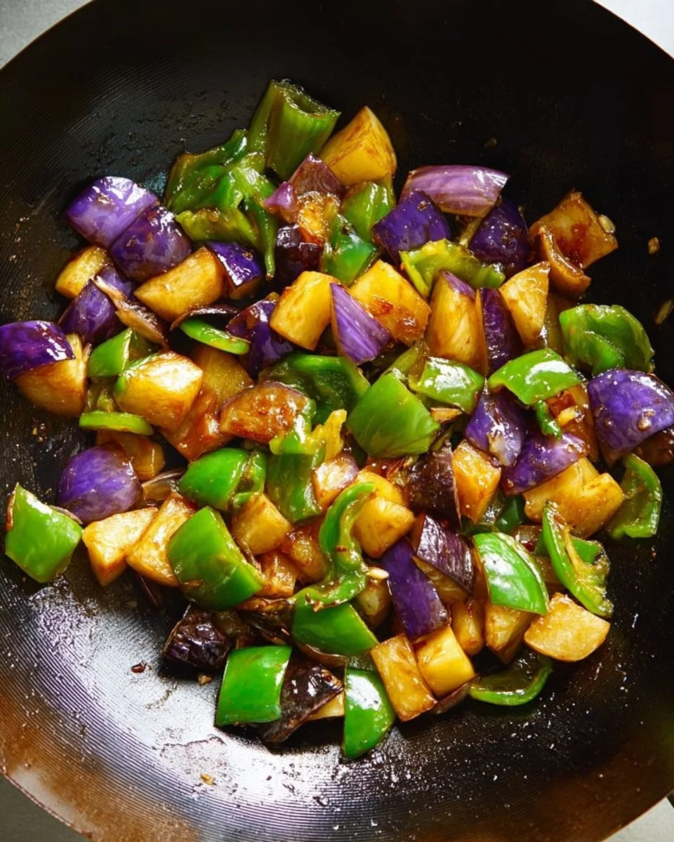 Plate of Dongbei stir-fried eggplant, potato, and bell pepper