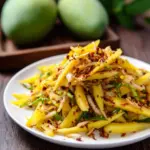 Delicious Thai Green Mango Salad with fresh ingredients and vibrant flavors.