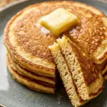 Fluffy flourless cottage cheese pancakes served with fresh berries.
