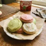 Colorful Jello Sugar Cookies on a plate, showcasing their fruity design.